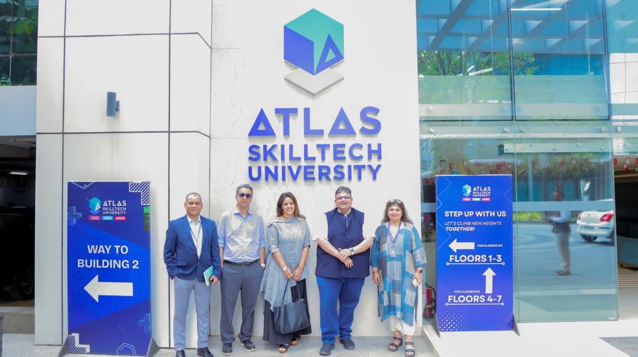 Photo by SG on April 17, 2026. May be an image of text that says 'ATLAS SKILATECH BSITY NGK NO ATLAS SKILLTECH UNIVERSITY WAY WAYTO TO BUILDING 2 ATLAS STEP STEPUPWITHUS WITH US YDBETNEATWNEIONTS CLINBNE TOGETHER! GLASNN FLOORS1-3 1-3 ↑ FLOORS4- 4-7'.