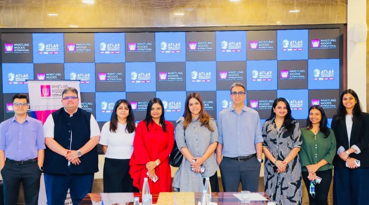 Photo by SG on April 17, 2026. May be an image of one or more people, people standing, office and text.